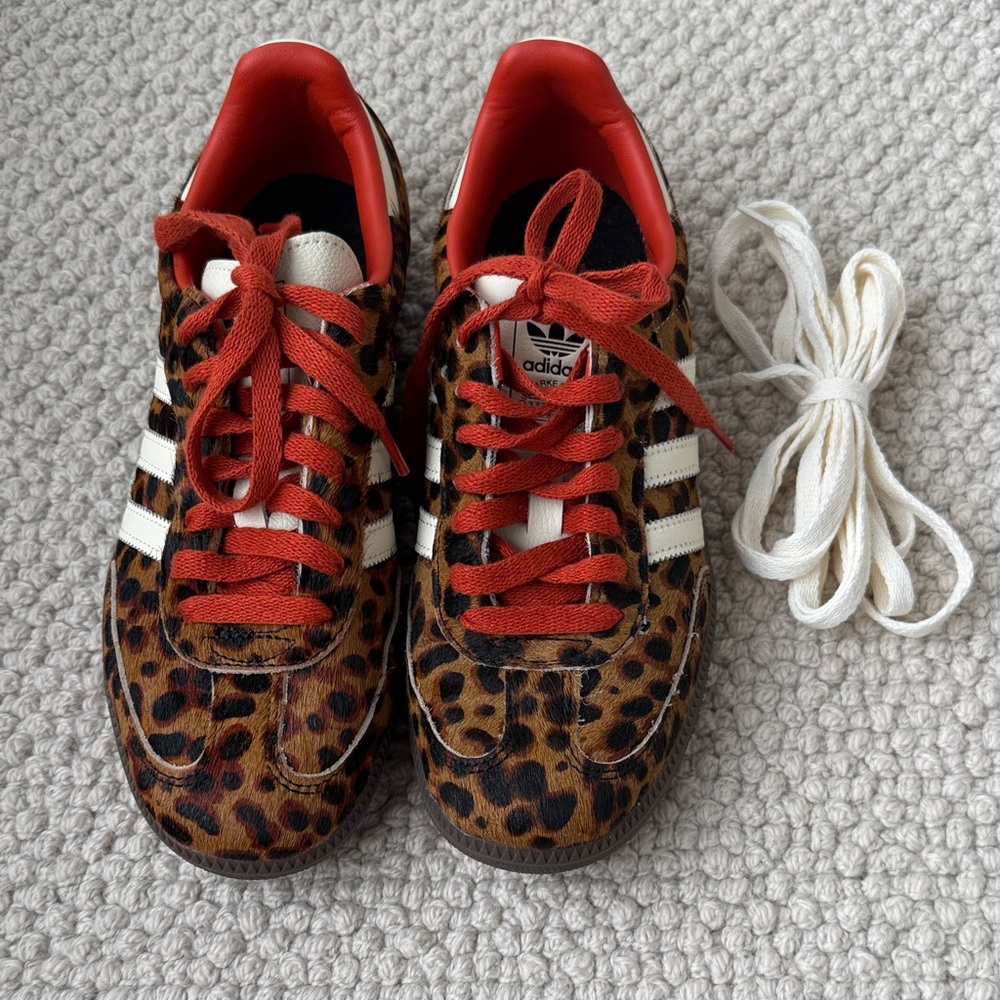 Worn once!! Brand new adidas Leopard  Sneakers with Red & White Stripes